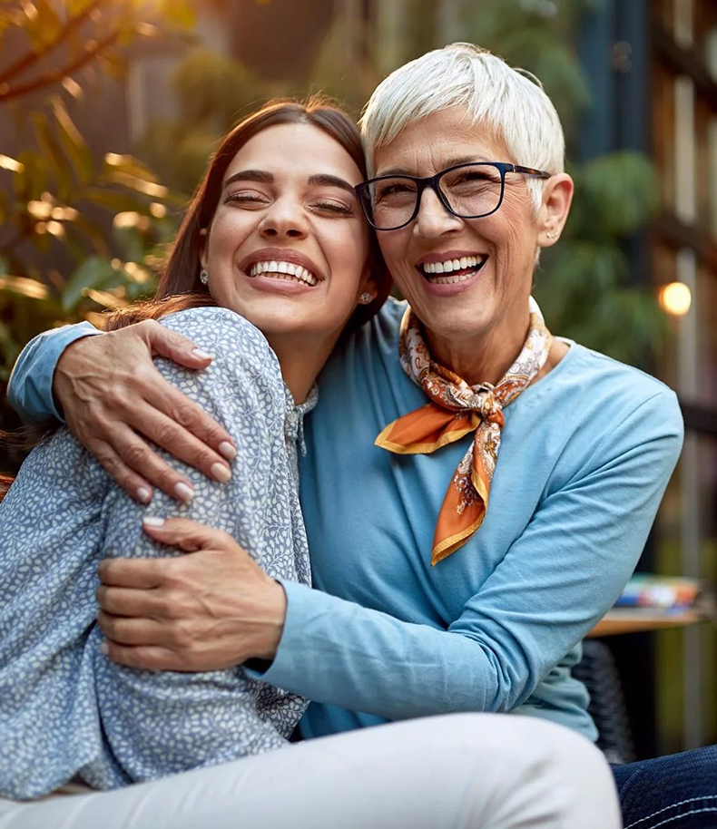 Two happy women with bright smile