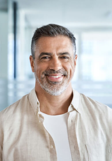 Man smiling after emergency dental care in Burleson