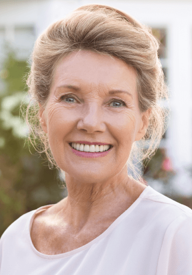 Restored smile after dental implant treatment in Burleson