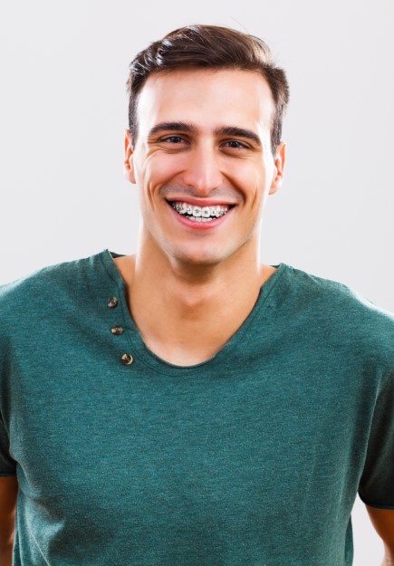 man smiling after orthodontic care