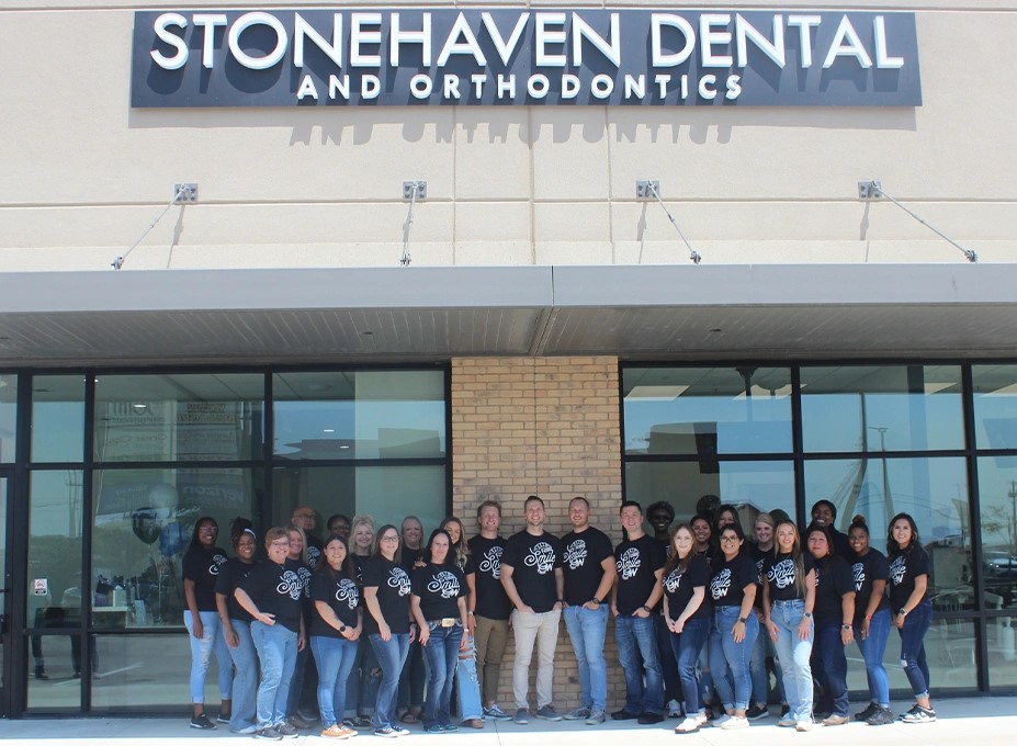 Stonehaven Dental and Orthodontics team standing in front of Killeen office