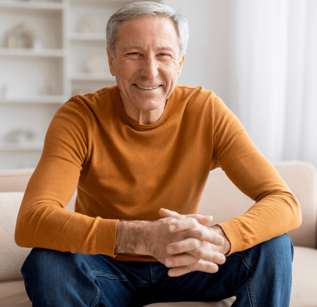 man after getting treatment from restorative dentist in burleson