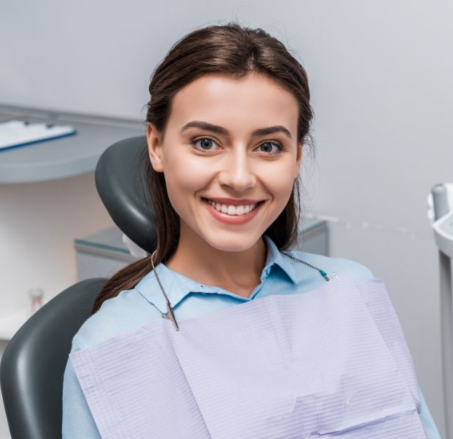 patient smiling after dental restoration at Stonehaven Dental Killeen Practice